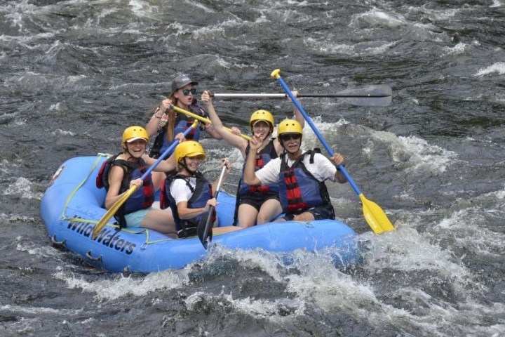 a man in a raft on the water